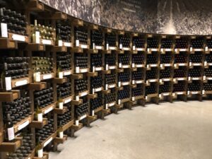 Curved wine bottle rack in a wine cellar